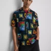 Camisas com gola revere e estampado «Resort»