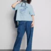 Camiseta gráfica de algodão com corte largo