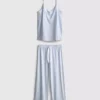 Pijamas com camisola de alças e laço em cetim estampado