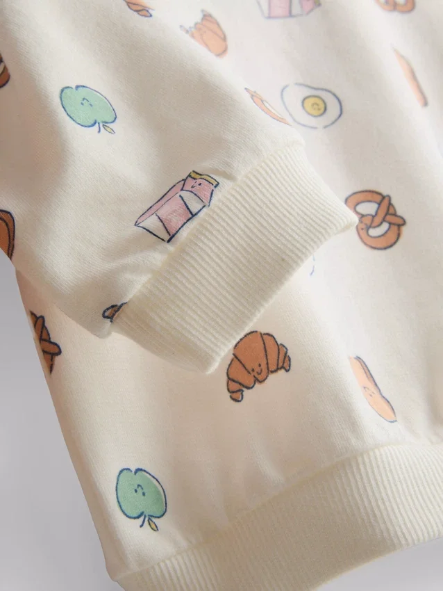 0-18 meses | Conjunto de camisola e calções com padrão de comida