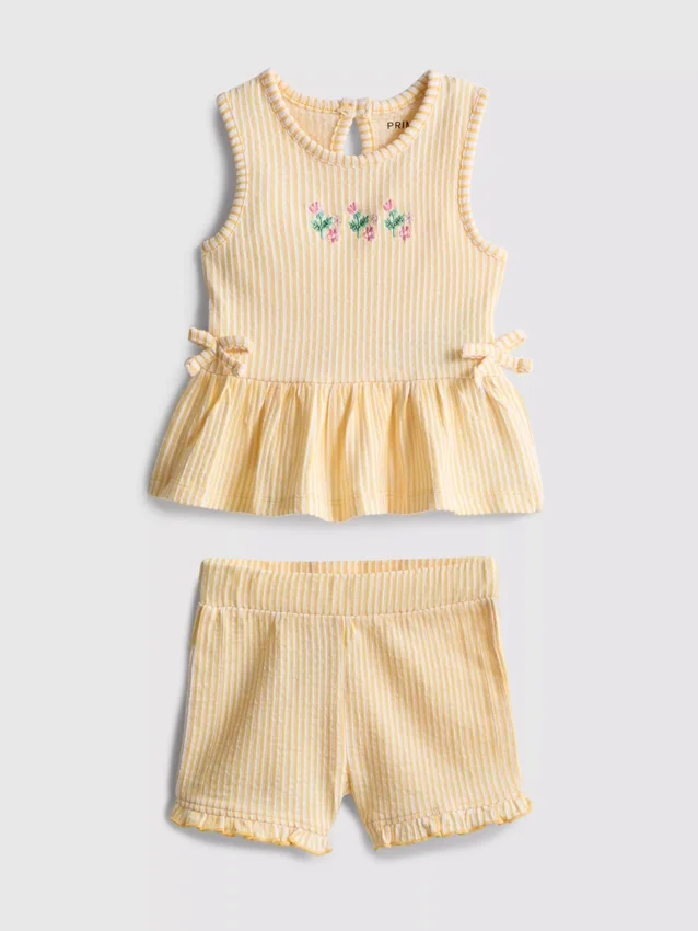 0-36 meses | Conjunto composto por blusa com bainha peplum bordada com motivos florais e calções