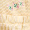 0-36 meses | Conjunto composto por blusa com bainha peplum bordada com motivos florais e calções