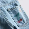 1,5-8 anos | Jeans com bordados de frutas