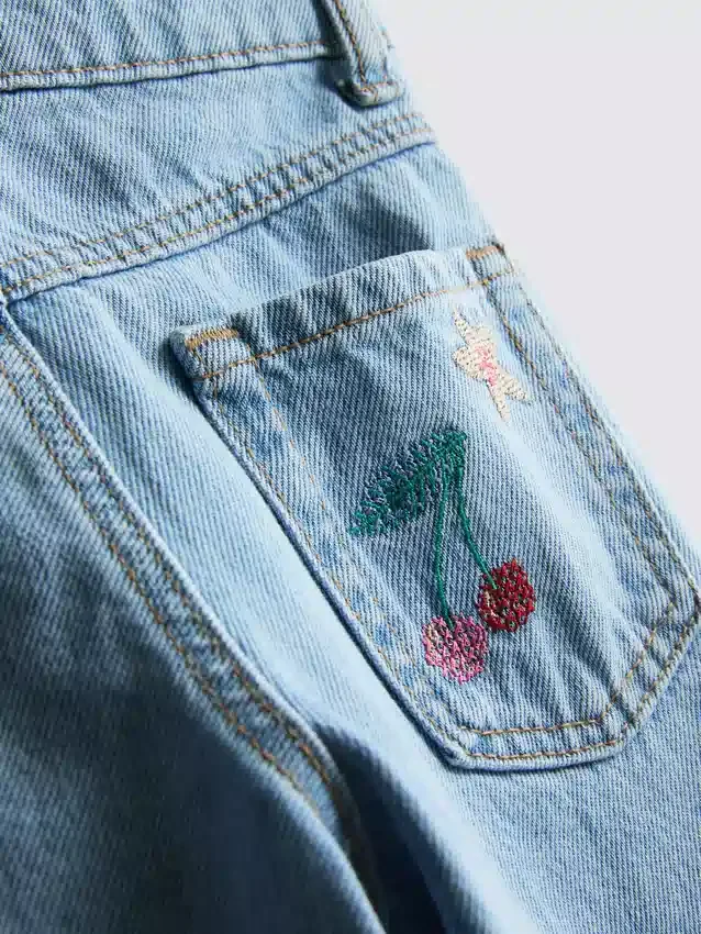 1,5-8 anos | Jeans com bordados de frutas