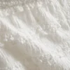 1,5-9 anos | Calças com folhos e textura enrugada