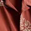 1,5-9 anos | camisa com bordado de folhas