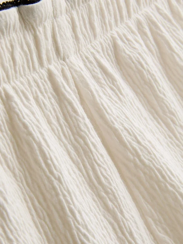 1,5-9 anos | Conjunto de blusa e calções com textura enrugada