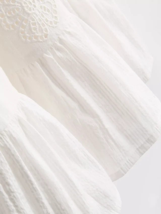 1,5-9 anos | vestido com ilhós em camadas