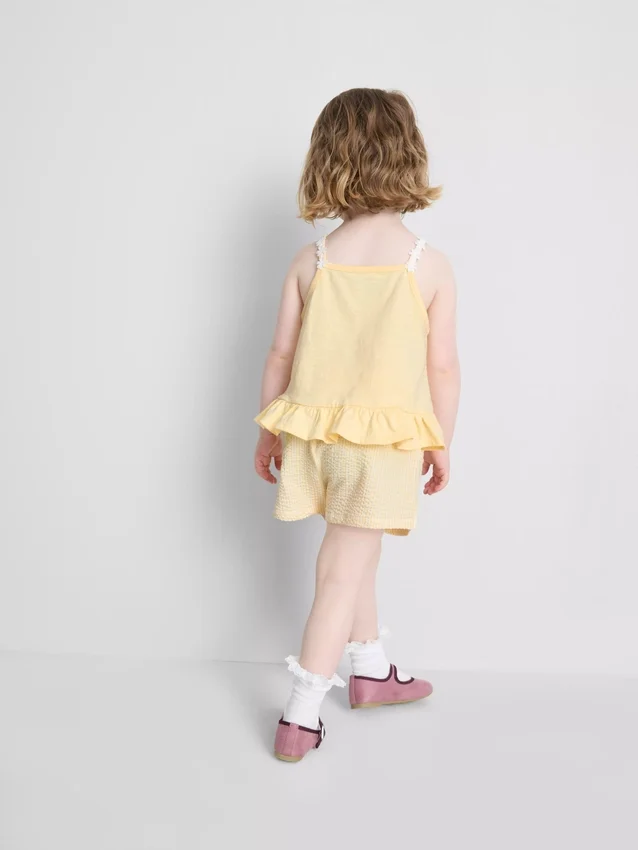 1-9 anos | Conjunto de top com peplum e calções