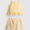 1-9 anos | Conjunto de top com peplum e calções