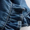 1-9 anos | Jeans com bainha com folhos