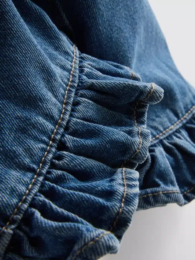 1-9 anos | Jeans com bainha com folhos
