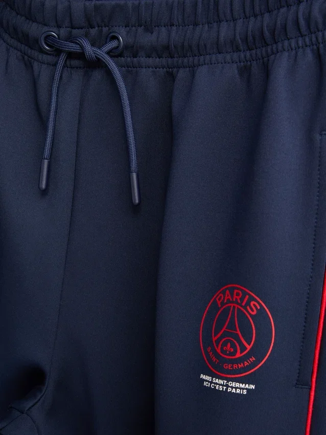 7-15 anos | Calças de fato de treino com bainha do Paris Saint-Germain F.C.