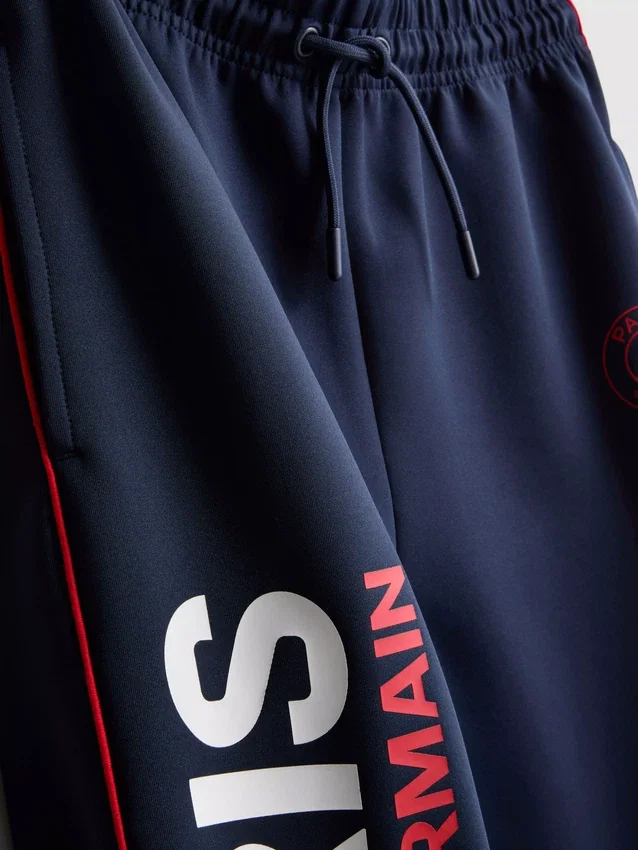 7-15 anos | Calças de fato de treino com bainha do Paris Saint-Germain F.C.