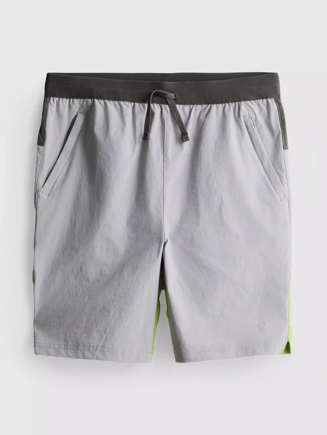 7-15 anos | calções desportivos