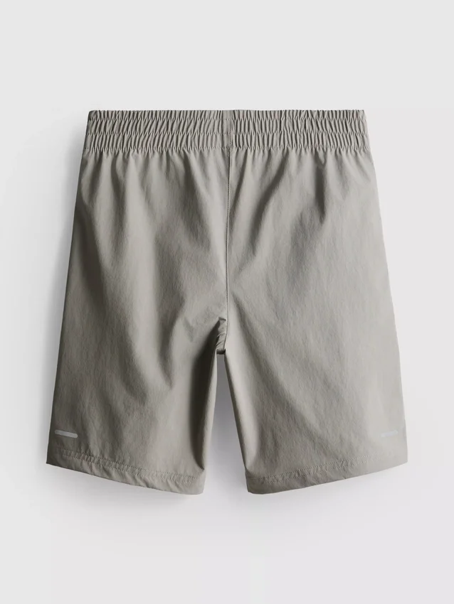 7-15 anos | calções desportivos