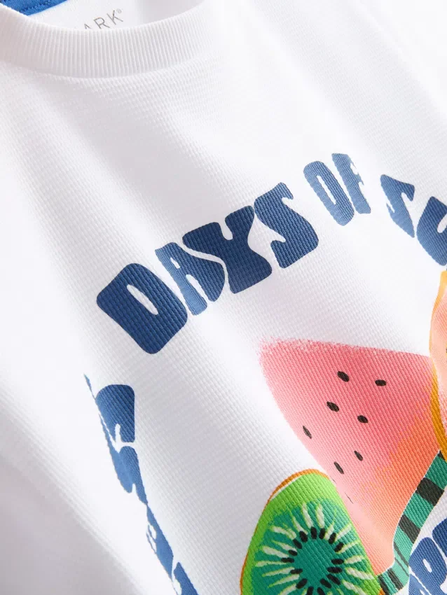 7-15 anos | Camisa com padrão de frutas e textura