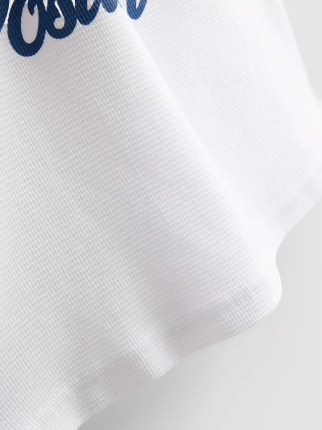 7-15 anos | Camisa com padrão de frutas e textura