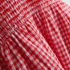 7-15 anos | Conjunto de blusa e saia xadrez