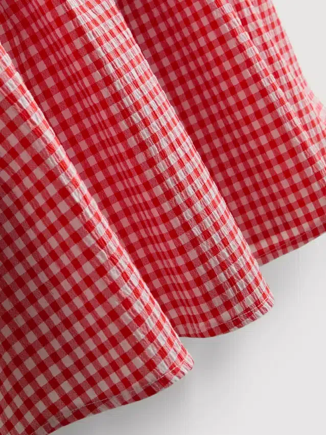 7-15 anos | Conjunto de blusa e saia xadrez