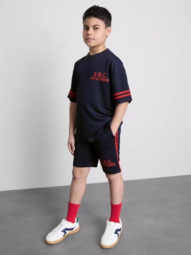7-15 anos | Conjunto de camisas e calções em malha desportiva