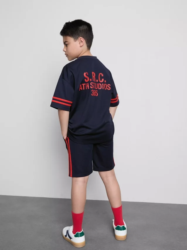 7-15 anos | Conjunto de camisas e calções em malha desportiva