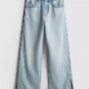 7-15 anos | Jeans de perna larga com fenda na bainha