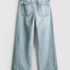 7-15 anos | Jeans de perna larga com fenda na bainha