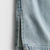 7-15 anos | Jeans de perna larga com fenda na bainha