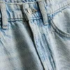 7-15 anos | Jeans de perna larga com fenda na bainha