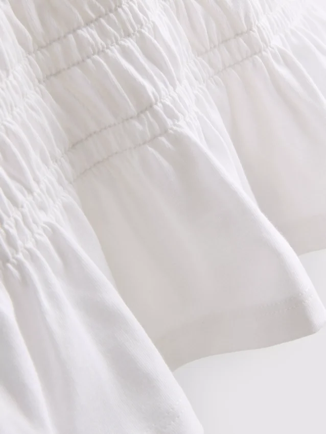 7-15 anos | T-shirt com peplum franzido