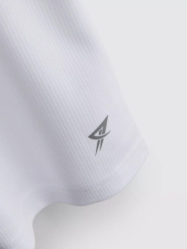 7-15 anos | T-shirt desportiva em malha