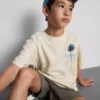 7-15 anos | T-shirt texturada com padrão de palmeiras