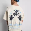 7-15 anos | T-shirt texturada com padrão de palmeiras