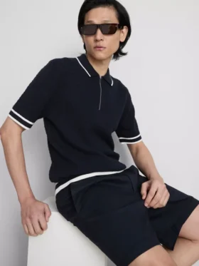 A camisa polo com fecho texturizada da The Edit