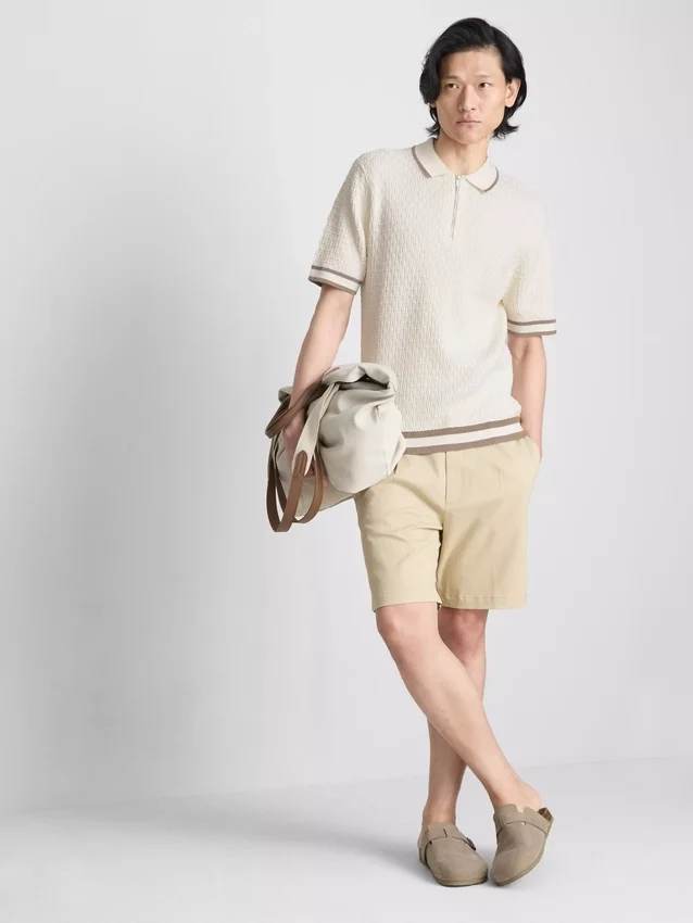 A camisa polo com fecho texturizada da The Edit