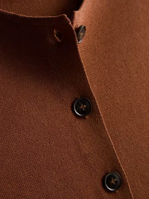 A camisola sem mangas de malha com botões da coleção «The Edit»