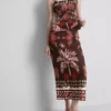 A saia midi estampada em mistura de linho da The Edit