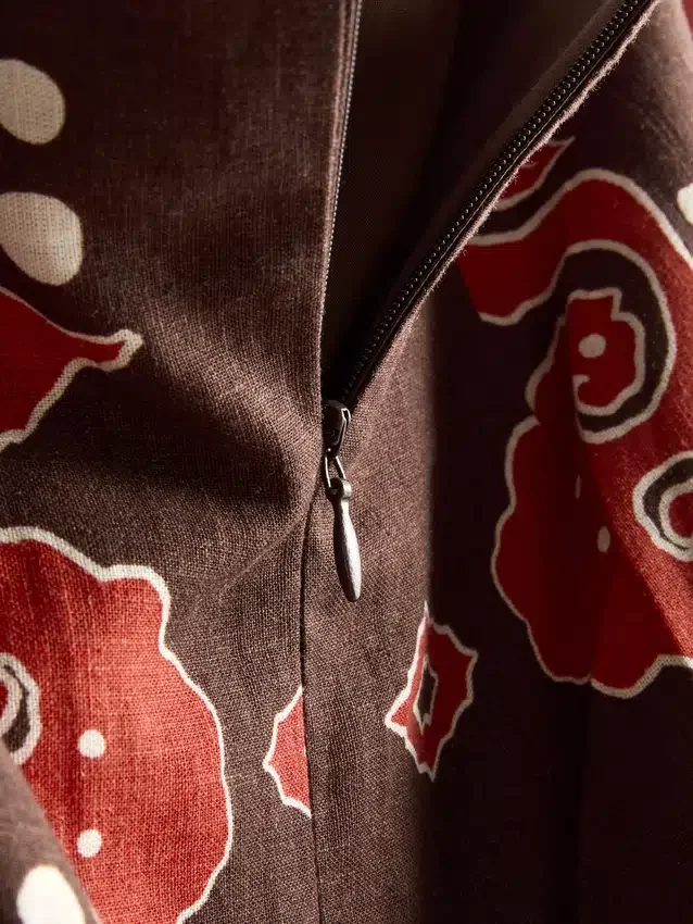 A saia midi estampada em mistura de linho da The Edit