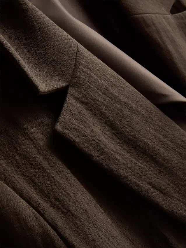 Blazer texturado com lapelas recortadas