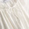 Blusa bordada com mangas balão