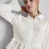 Blusa com bainha peplum franzida