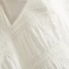 Blusa com bainha peplum franzida