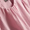 Blusa com mangas balão texturizadas