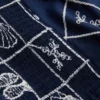 Blusa de algodão com decote halter e detalhes em renda