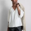Blusa de manga 3/4 com decote em V