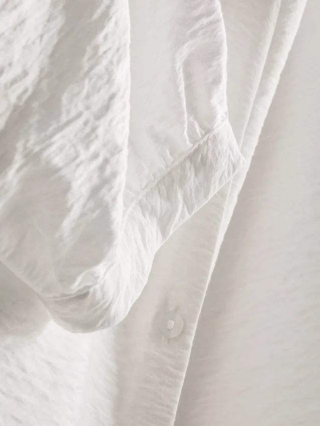 Blusa de manga 3/4 com decote em V