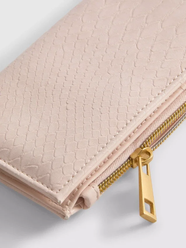 Bolsa com efeito de pele de crocodilo