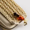Bolsa tecida com fecho de correr