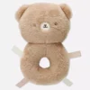 Brinquedo de peluche em forma de urso